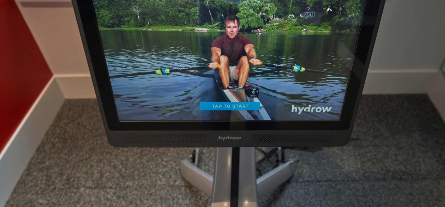 Close-up of the screen and controls on a Technogym bike in our dedicated spin studio amenity, offering digital fitness classes for residents.